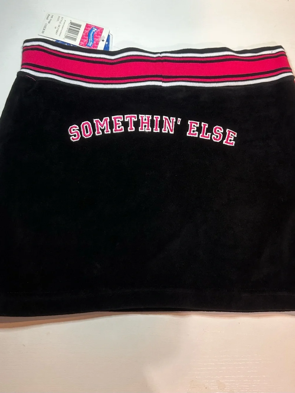 Skechers Black Velour Mini Skirt with Pink Trim. Juniors size medium